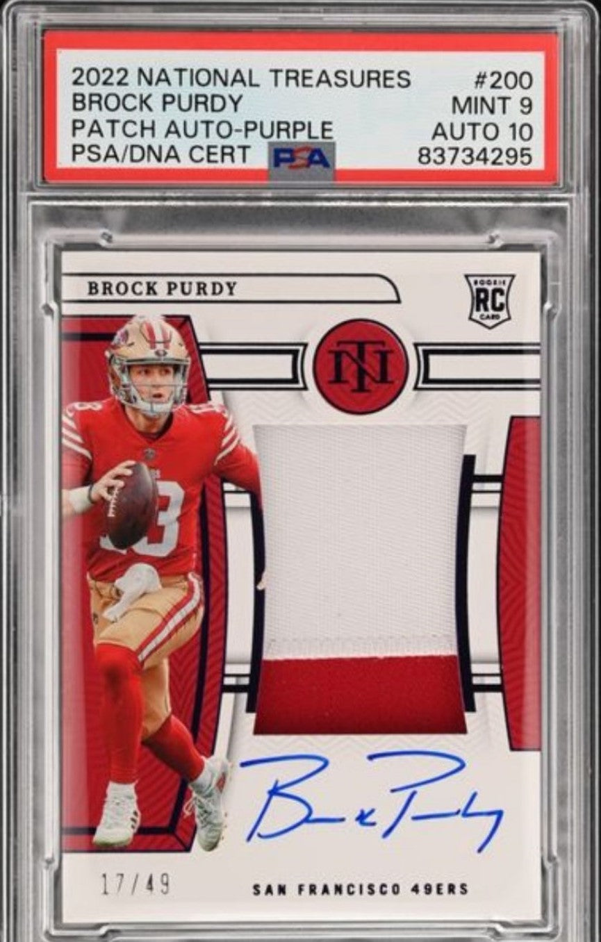 2022 PANINI NATIONAL TREASURES BROCK PURDY PATCH AUTO RPA-PURPLE #200 MINT 9 — exact item photographed by BlackJadedWolf, BlackJadedWolf